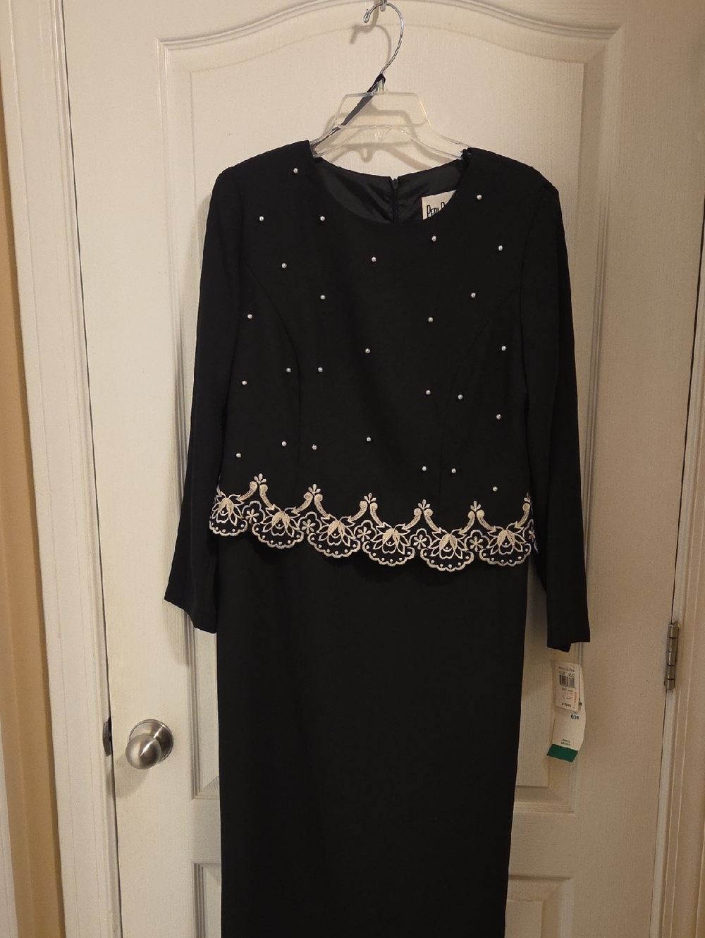 Elegant Black Dress with Ivory Embroidered Hem